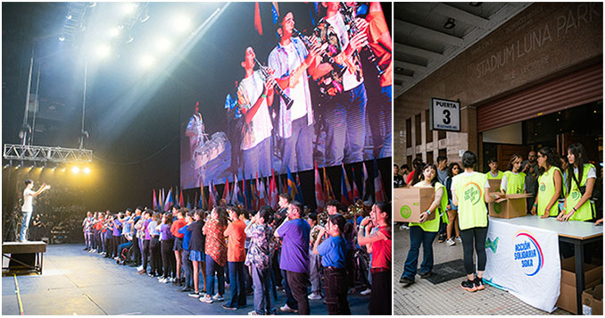 Composite photo a conductor conducting a large group of musicians standing under large screens, and people in green T-shirts at a table and one person carrying a box.