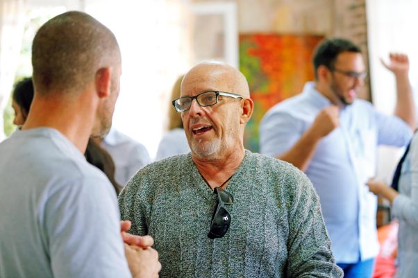 Two men standing and having a conversation