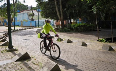 Clarisa out for delivery on her bicycle